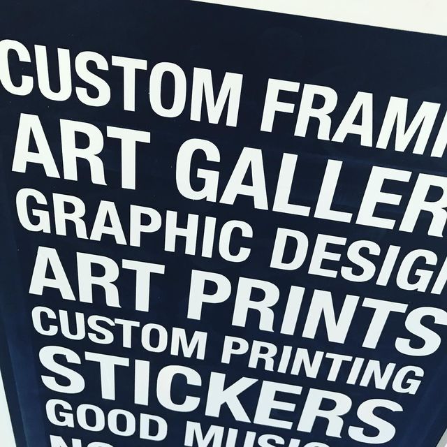 Sign displaying services: Custom Framing, Art Gallery, Graphic Design, Art Prints, Custom Printing Stickers and Good Music